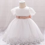 rochita-botez-fetita-alba-cu-dantela-si-panglica-roz-paietata-eleganta-si-delicata-809246